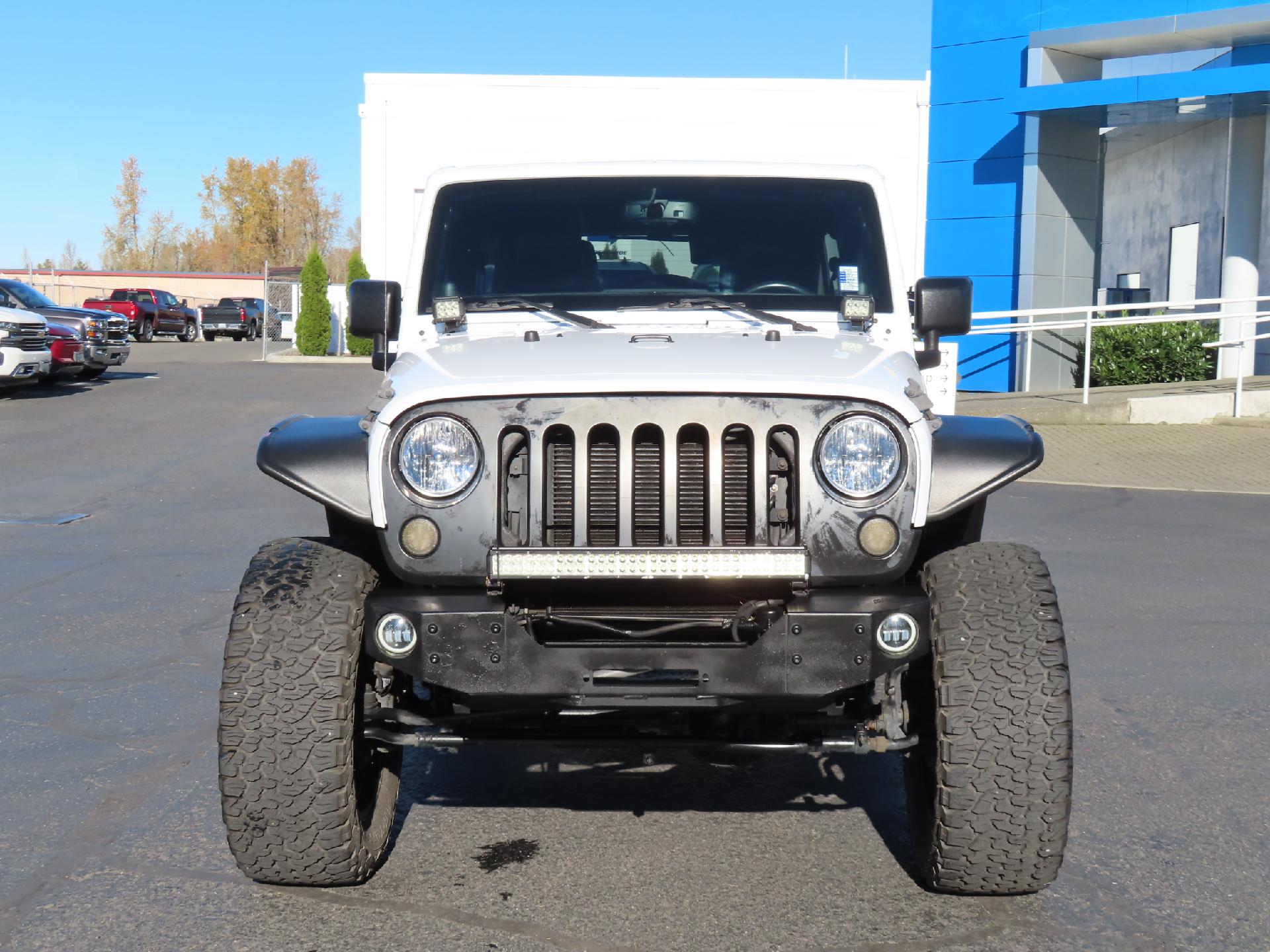 Used 2013 Jeep Wrangler Unlimited Sahara with VIN 1C4BJWEGXDL621992 for sale in Enumclaw, WA