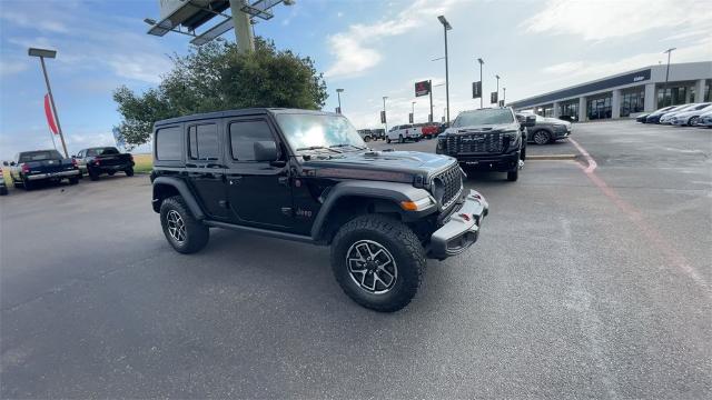 Used 2024 Jeep Wrangler 4-Door Rubicon with VIN 1C4PJXFN4RW128873 for sale in Killeen, TX