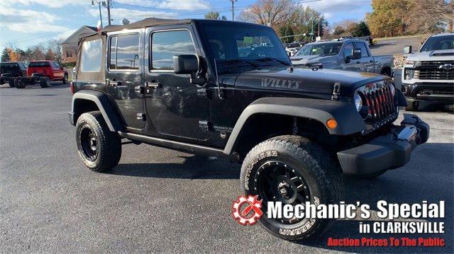 Used 2016 Jeep Wrangler Unlimited Willys Wheeler with VIN 1C4HJWDG4GL201709 for sale in Madison, TN