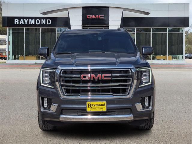 Used 2021 GMC Yukon SLT with VIN 1GKS1BKD7MR323873 for sale in Center, TX