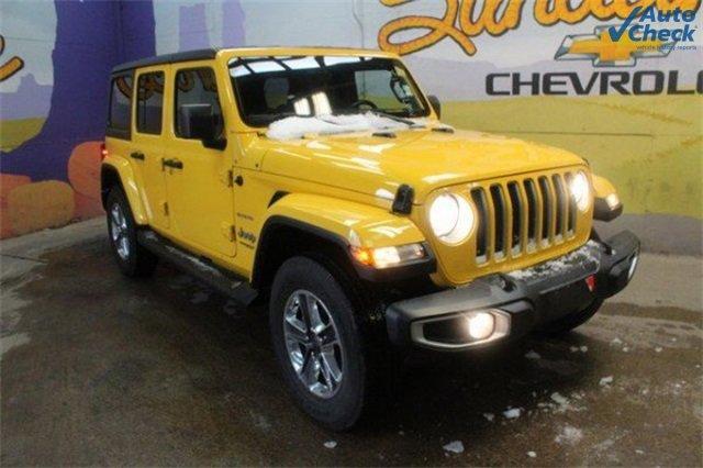 Used 2021 Jeep Wrangler Unlimited Sahara with VIN 1C4HJXEN3MW724412 for sale in Saint Johns, MI