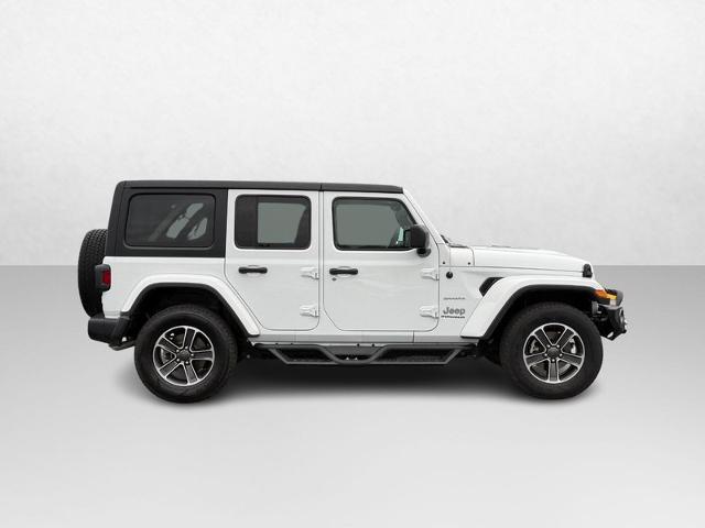Used 2023 Jeep Wrangler 4-Door Sahara with VIN 1C4HJXEN0PW665677 for sale in Hannibal, MO