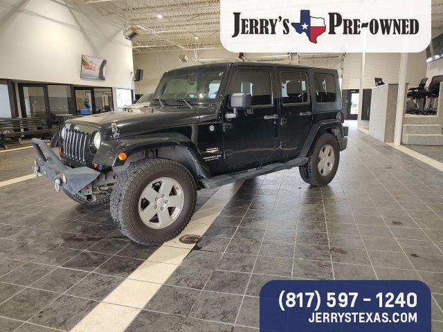 Used 2007 Jeep Wrangler Unlimited Sahara with VIN 1J4GA59107L151296 for sale in Weatherford, TX