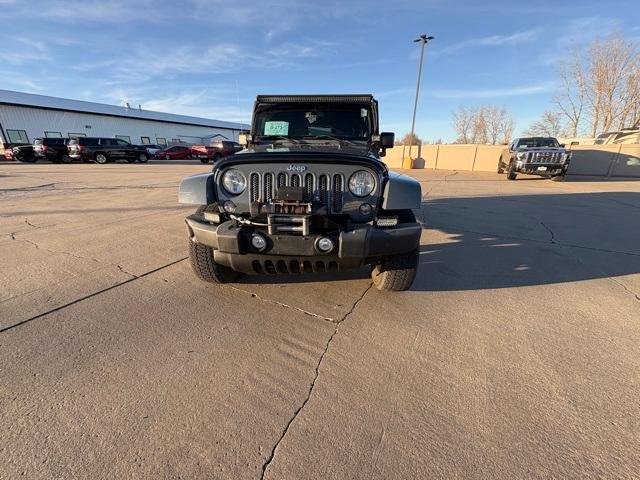 Used 2014 Jeep Wrangler Unlimited Sahara with VIN 1C4BJWEG6EL140994 for sale in Lennox, SD