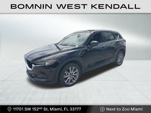 Used 2021 Mazda CX-5 Grand Touring with VIN JM3KFBDM8M1495958 for sale in Miami, FL