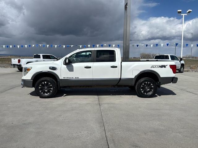 Used 2016 Nissan Titan XD Pro-4X with VIN 1N6BA1F43GN516658 for sale in Hardin, MT