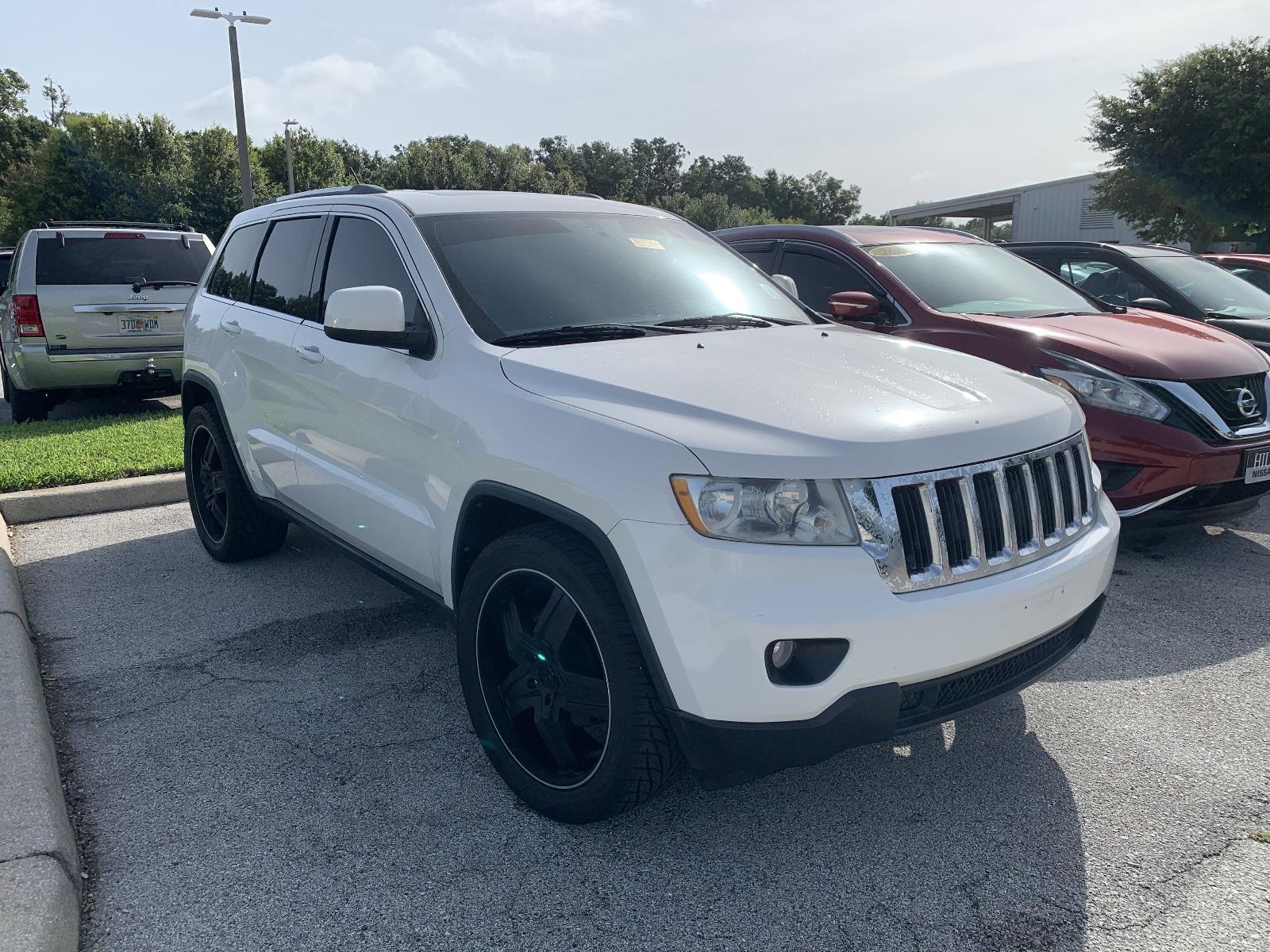 Used 2012 Jeep Grand Cherokee Laredo X with VIN 1C4RJEAT2CC270862 for sale in Winter Haven, FL