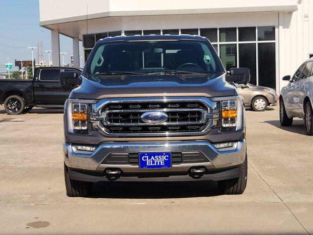 Used 2021 Ford F-150 XLT with VIN 1FTFW1E55MFB26683 for sale in Houston, TX