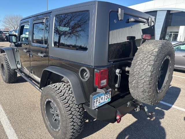 Used 2015 Jeep Wrangler Unlimited Rubicon with VIN 1C4HJWFG4FL710582 for sale in Mankato, Minnesota