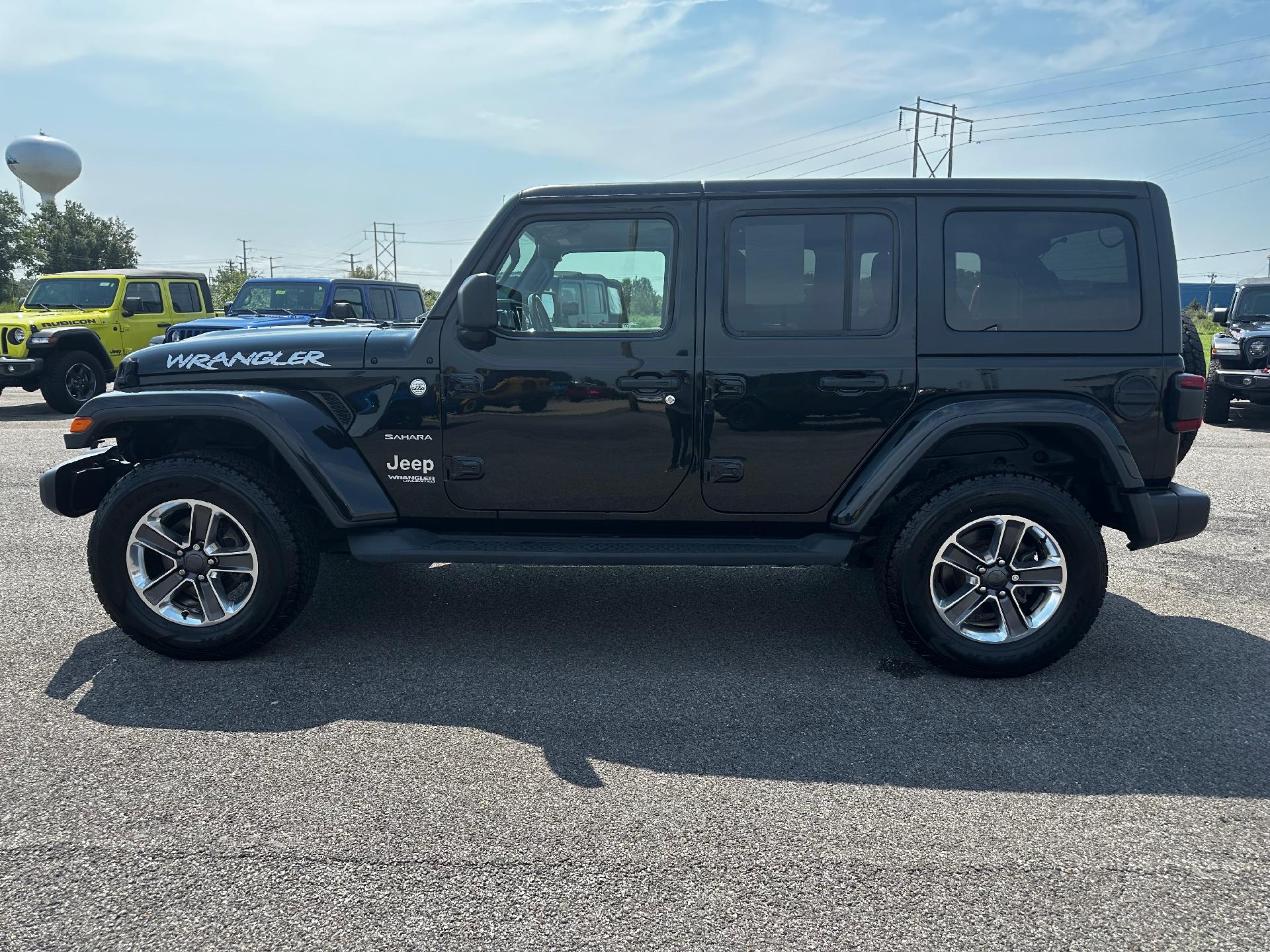 Used 2021 Jeep Wrangler Unlimited Sahara with VIN 1C4HJXEM5MW503658 for sale in Salem, IL