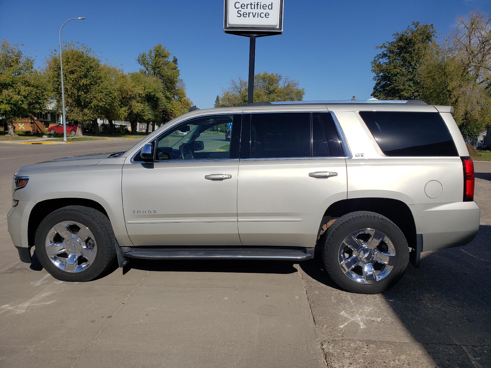 Used 2015 Chevrolet Tahoe LTZ with VIN 1GNSKCKC5FR280490 for sale in Cavalier, ND