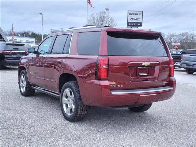 Used 2020 Chevrolet Tahoe Premier with VIN 1GNSKCKC9LR148313 for sale in Whitehall, MI