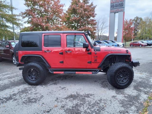 Used 2010 Jeep Wrangler Unlimited Sport with VIN 1J4BB3H1XAL142075 for sale in Clarksville, TN