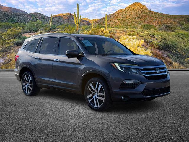 Used 2018 Honda Pilot Touring with VIN 5FNYF6H99JB014649 for sale in Glendale, AZ