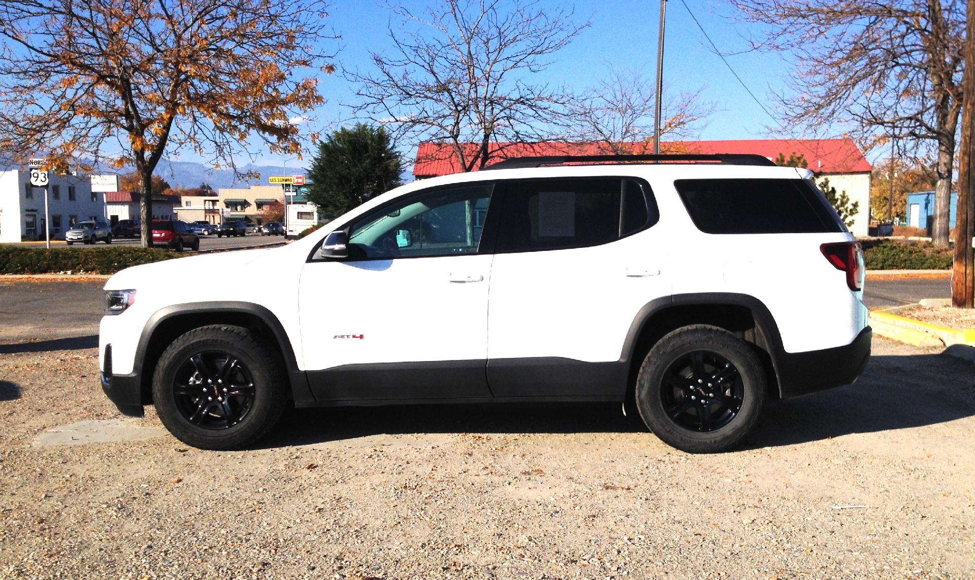 Used 2021 GMC Acadia AT4 with VIN 1GKKNLLS0MZ106995 for sale in Hamilton, MT