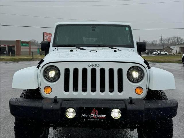 Used 2014 Jeep Wrangler Unlimited Rubicon with VIN 1C4BJWFG7EL234509 for sale in Dexter, MO