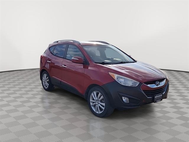 Used 2013 Hyundai Tucson Limited with VIN KM8JUCAC8DU565433 for sale in Winner, SD