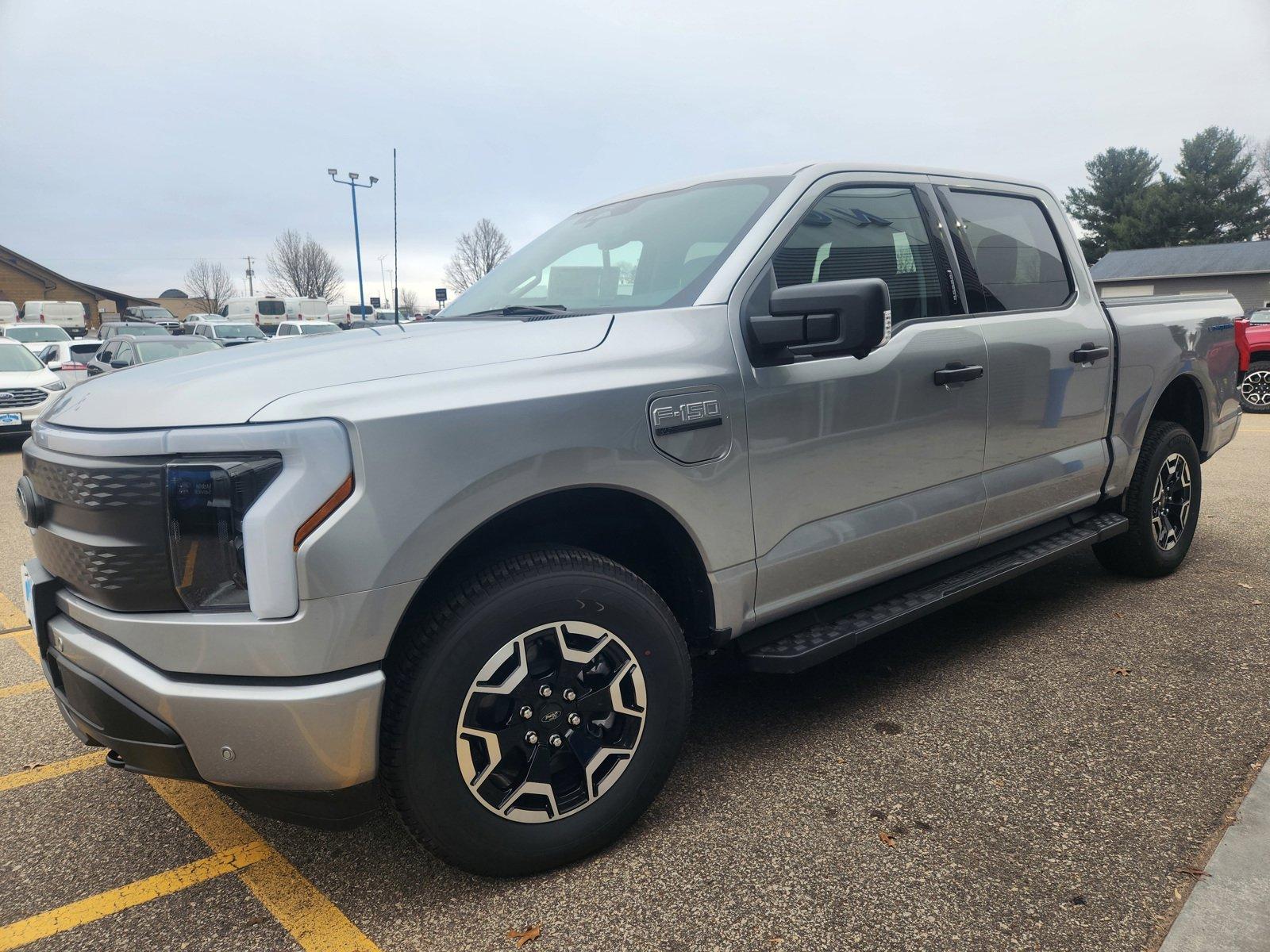 Used 2023 Ford F-150 Lightning XLT with VIN 1FTVW1EL1PWG41355 for sale in Menomonie, WI