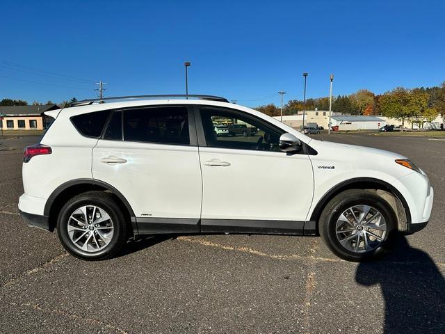 Used 2018 Toyota RAV4 XLE with VIN JTMRJREV1JD236051 for sale in Mora, Minnesota