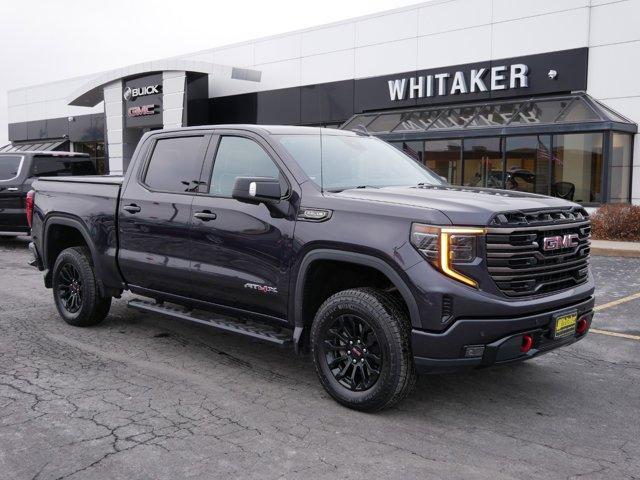 Certified 2022 GMC Sierra 1500 AT4X with VIN 3GTUUFEL5NG634855 for sale in Forest Lake, Minnesota