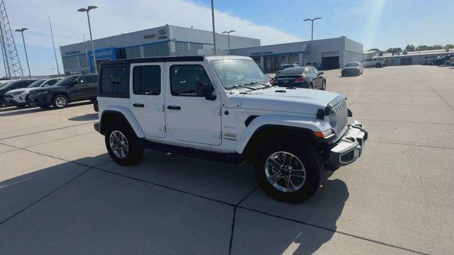 Used 2022 Jeep Wrangler Unlimited Sahara with VIN 1C4HJXEG7NW247745 for sale in Grand Island, NE
