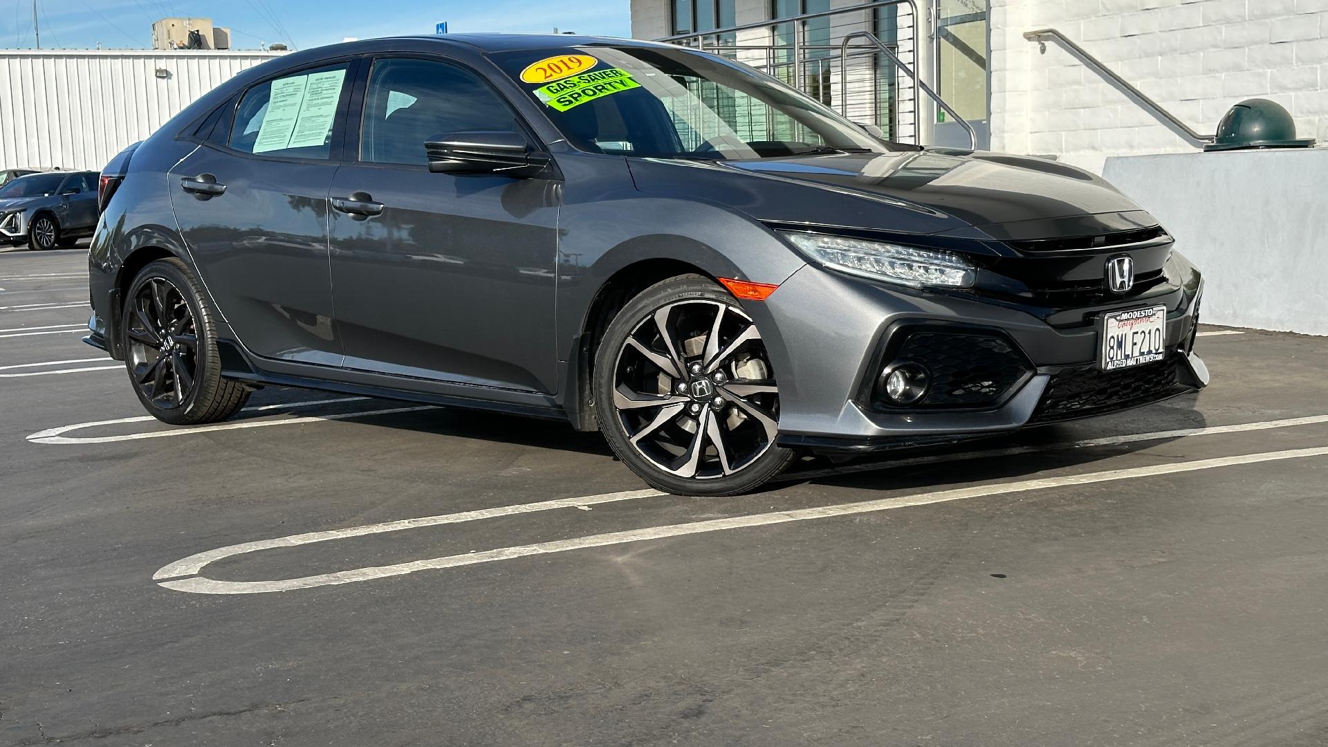 Used 2019 Honda Civic Hatchback Sport Touring with VIN SHHFK7H97KU423693 for sale in Modesto, CA