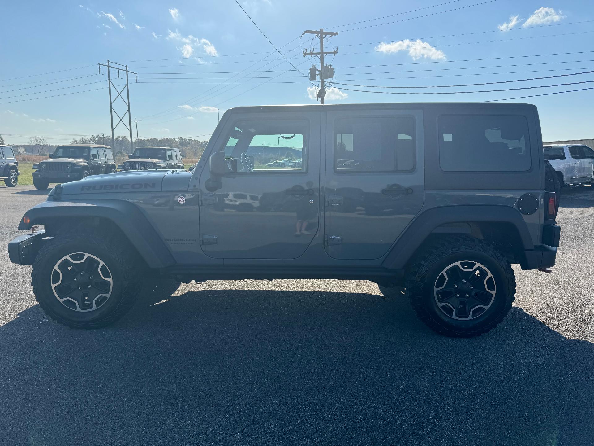 Used 2015 Jeep Wrangler Unlimited Rubicon with VIN 1C4HJWFG9FL569346 for sale in Salem, IL