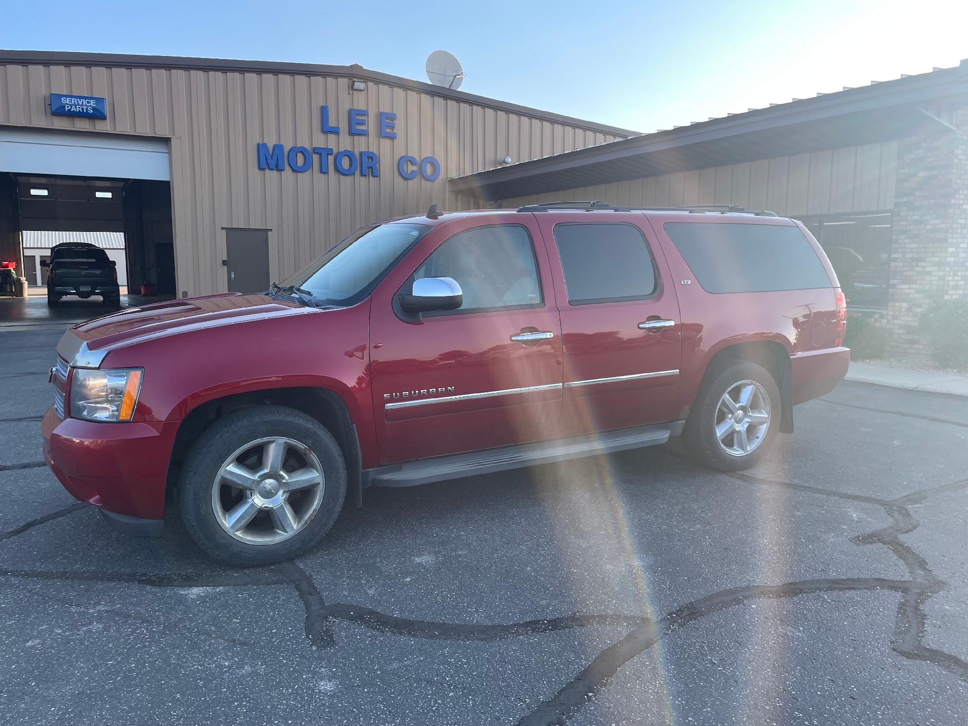 Used 2013 Chevrolet Suburban LTZ with VIN 1GNSKKE77DR324821 for sale in Dawson, Minnesota