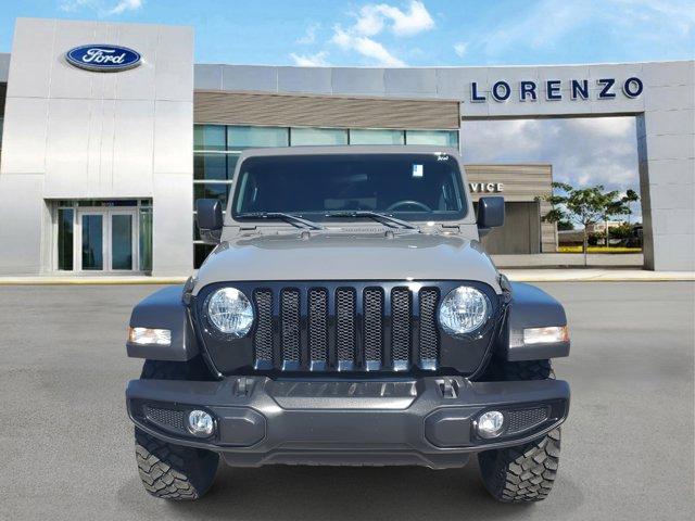 Used 2021 Jeep Wrangler Unlimited Willys Sport with VIN 1C4HJXDN4MW646725 for sale in Homestead, FL