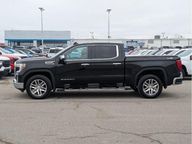 Used 2021 GMC Sierra 1500 SLT with VIN 3GTU9DEL0MG383201 for sale in Kansas City