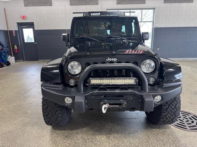 Used 2014 Jeep Wrangler Unlimited Rubicon with VIN 1C4BJWFG9EL222149 for sale in Plymouth, WI