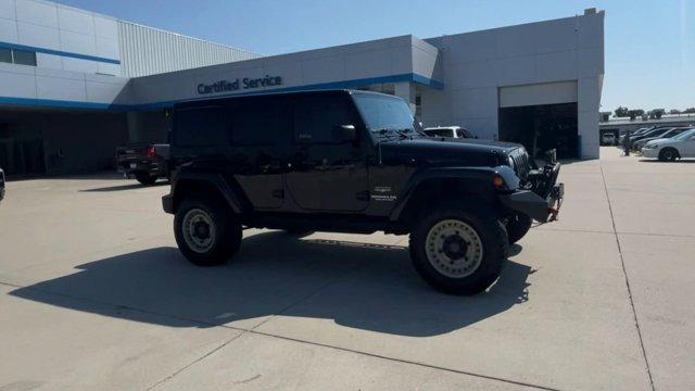 Used 2015 Jeep Wrangler Unlimited Sahara with VIN 1C4BJWEG1FL686975 for sale in Grand Island, NE