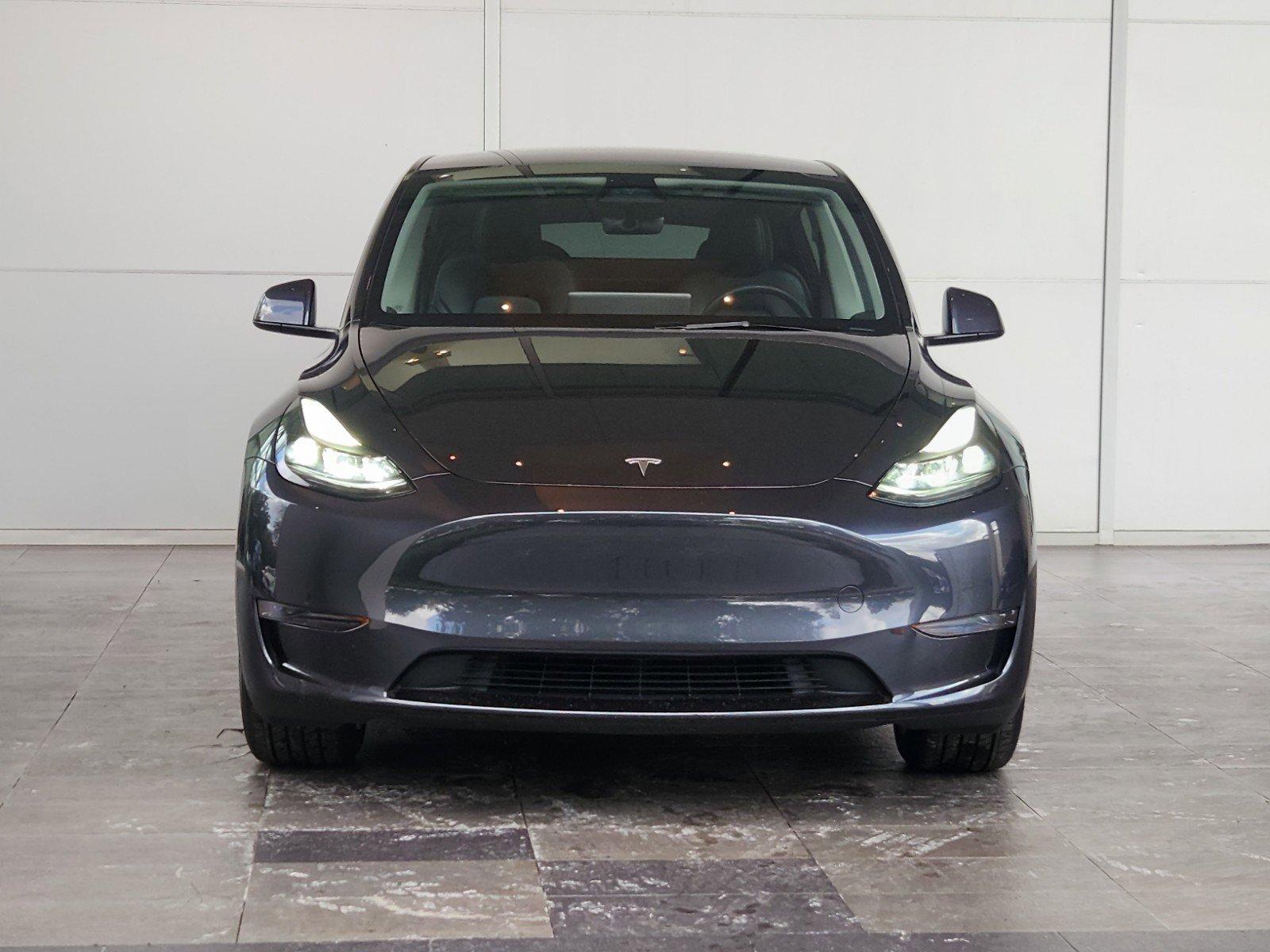 Used 2024 Tesla Model Y Long Range with VIN 7SAYGDED0RF054272 for sale in Houston, TX