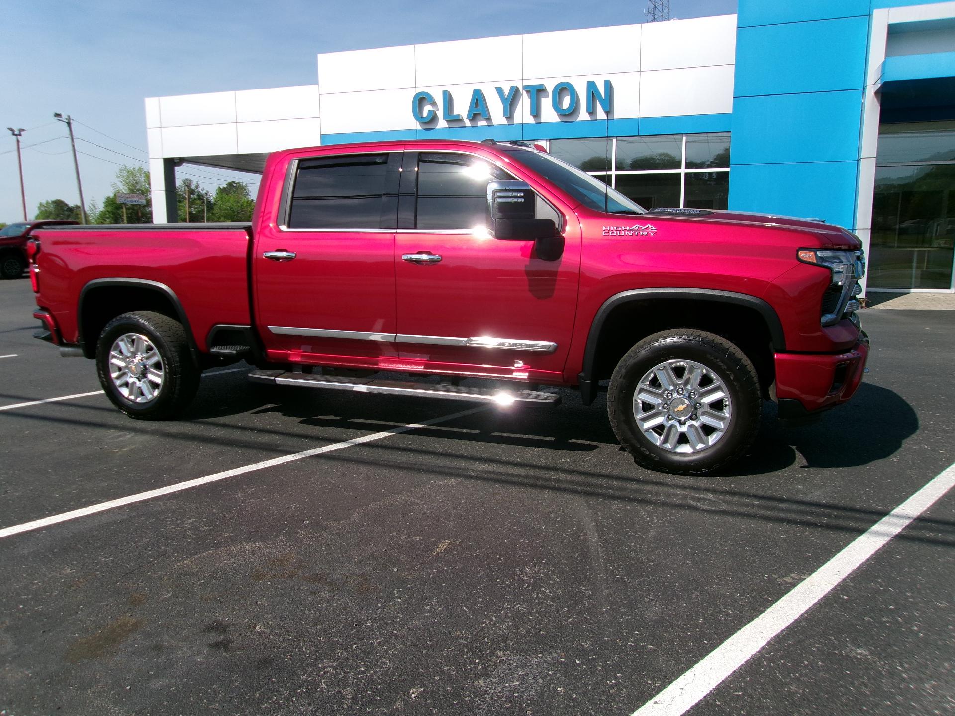 Radiant Red Tintcoat 2025 Chevrolet Silverado 2500HD High Country Crew Cab 4WD Pickup Truck Four-Wheel Drive Automatic
