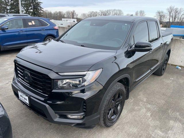 Used 2023 Honda Ridgeline RTL-E with VIN 5FPYK3F72PB015864 for sale in Puyallup, WA