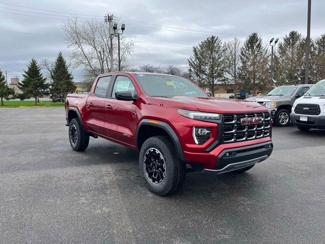 Volcanic Red Tintcoat 2026 GMC Canyon AT4 Crew Cab 4WD Pickup Truck Four-Wheel Drive 8-Speed Automatic