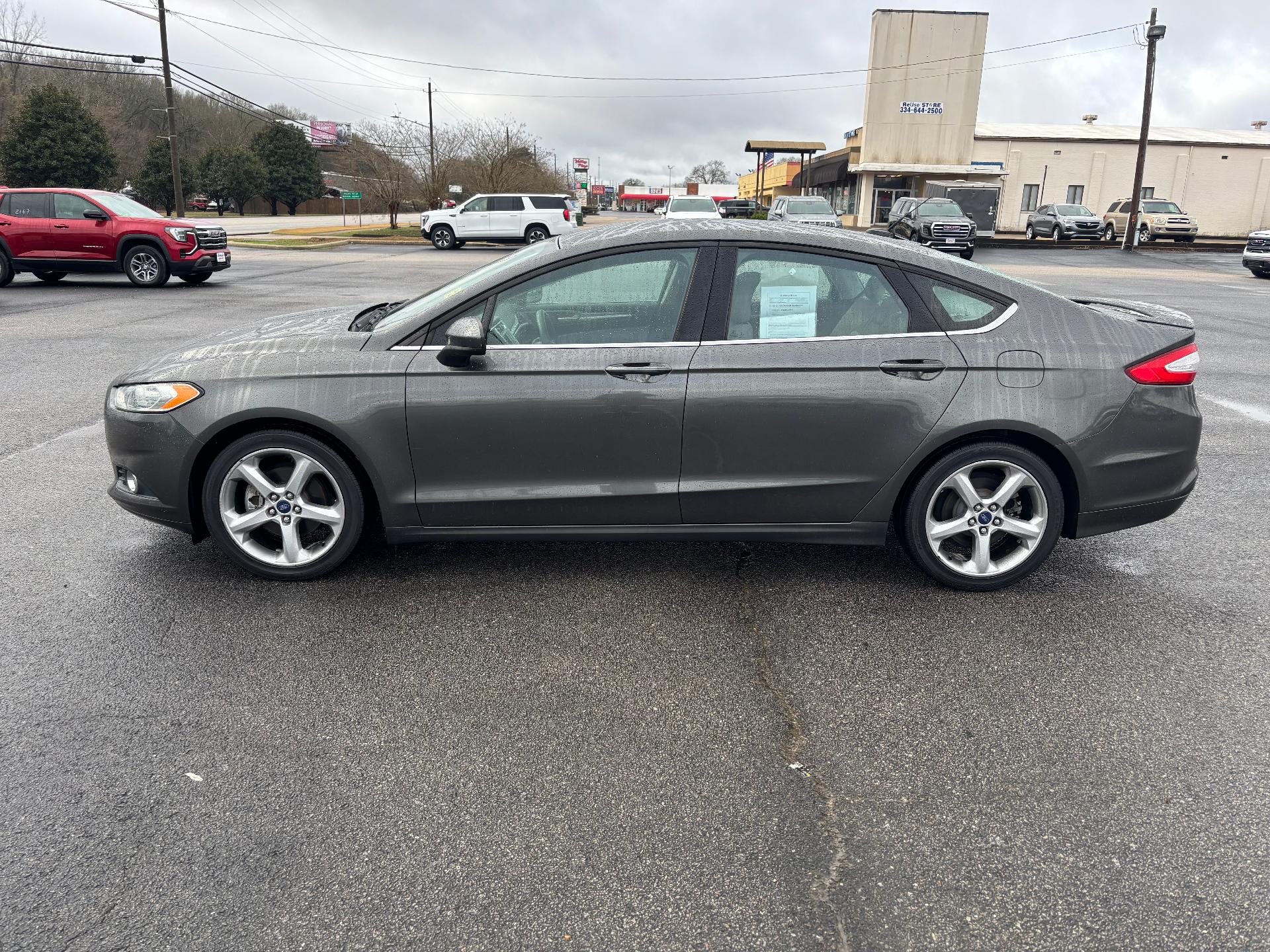 Used 2016 Ford Fusion S with VIN 3FA6P0G73GR109691 for sale in Lanett, AL