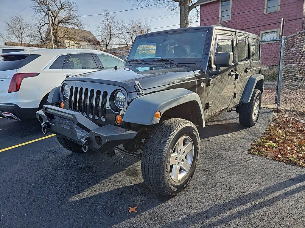 Used 2012 Jeep Wrangler Unlimited Sport with VIN 1C4BJWDG9CL277832 for sale in Akron, OH