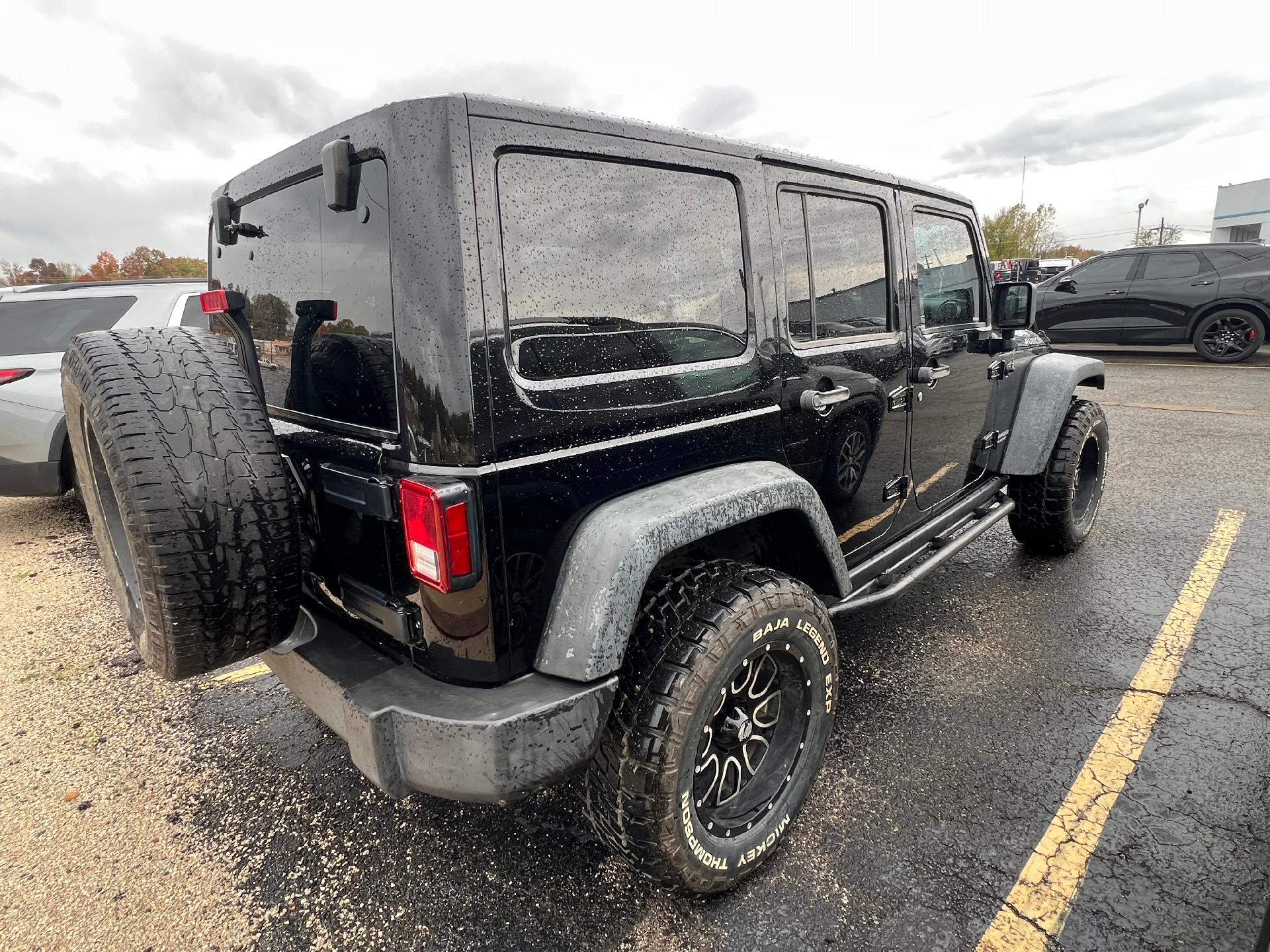 Used 2013 Jeep Wrangler Unlimited Rubicon with VIN 1C4BJWFG3DL619516 for sale in Doniphan, MO