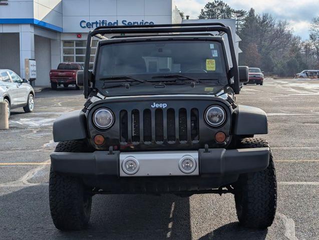 Used 2012 Jeep Wrangler Unlimited Sahara with VIN 1C4BJWEG1CL228283 for sale in Greenville, MI