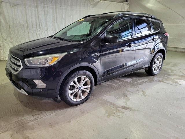 Used 2017 Ford Escape SE with VIN 1FMCU9GDXHUD89048 for sale in Pinconning, MI