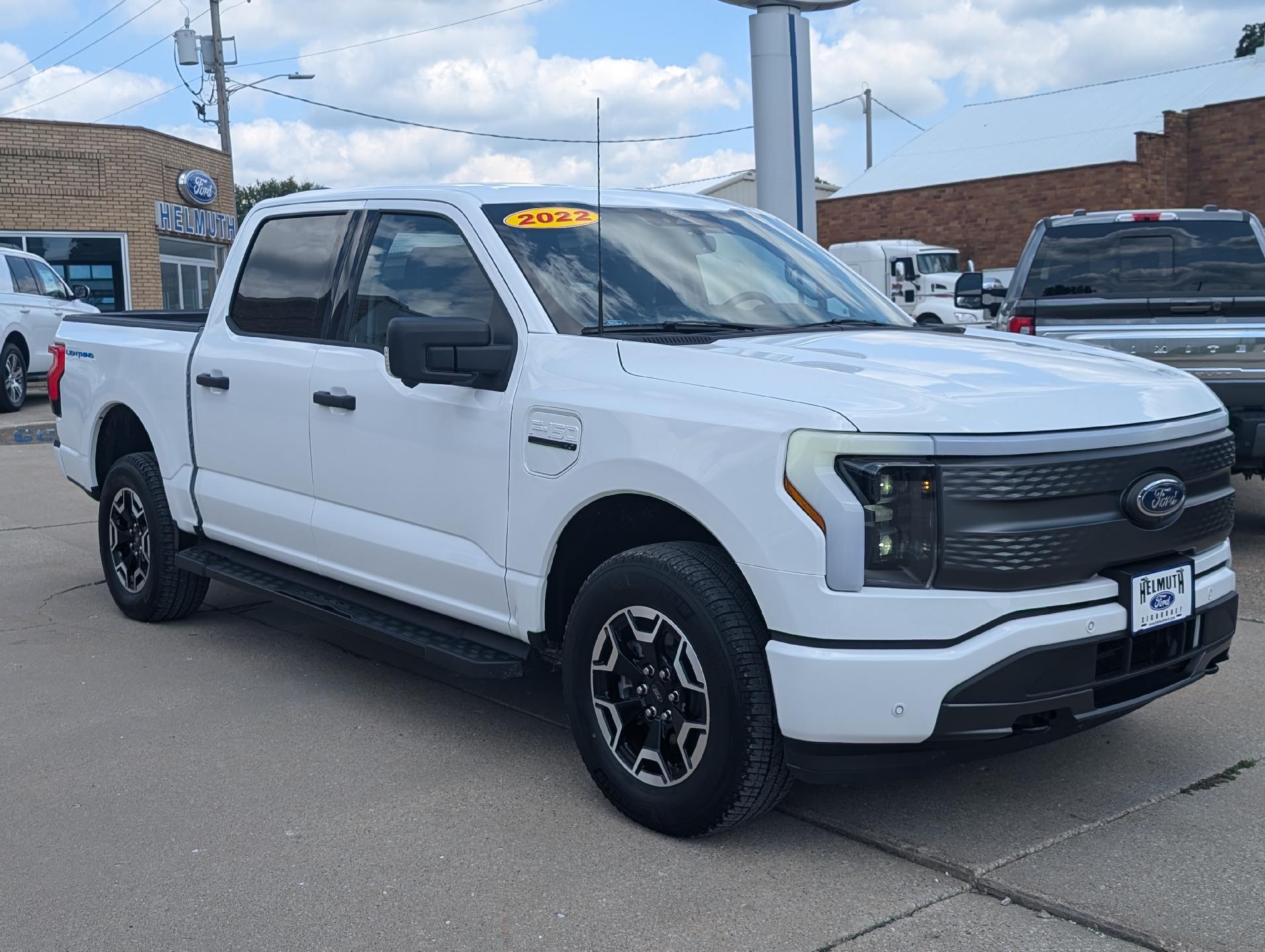 Used 2022 Ford F-150 Lightning XLT with VIN 1FTVW1EL9NWG05426 for sale in Sigourney, IA