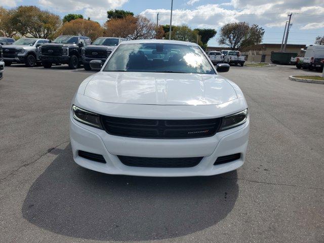 Used 2023 Dodge Charger SXT with VIN 2C3CDXBG7PH528794 for sale in Homestead, FL