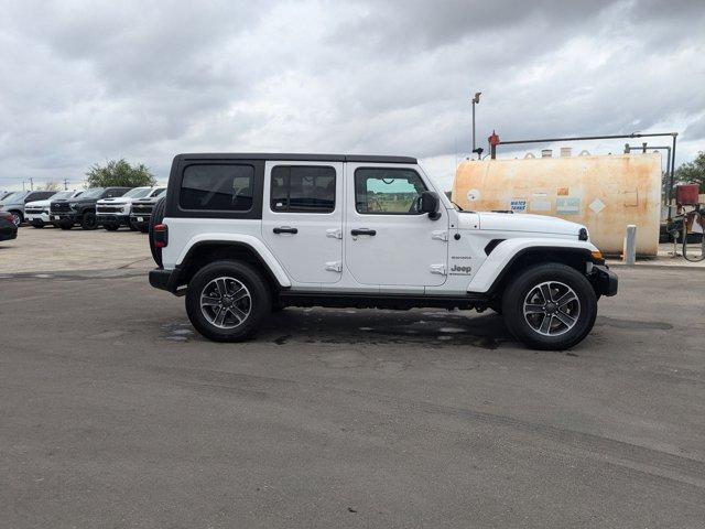 Used 2023 Jeep Wrangler 4-Door Sahara with VIN 1C4HJXEGXPW692421 for sale in Castroville, TX