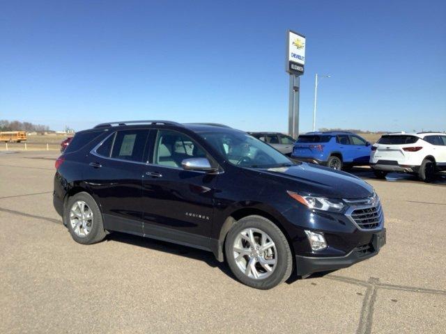 Used 2021 Chevrolet Equinox Premier with VIN 3GNAXXEV9MS119569 for sale in Truman, MN