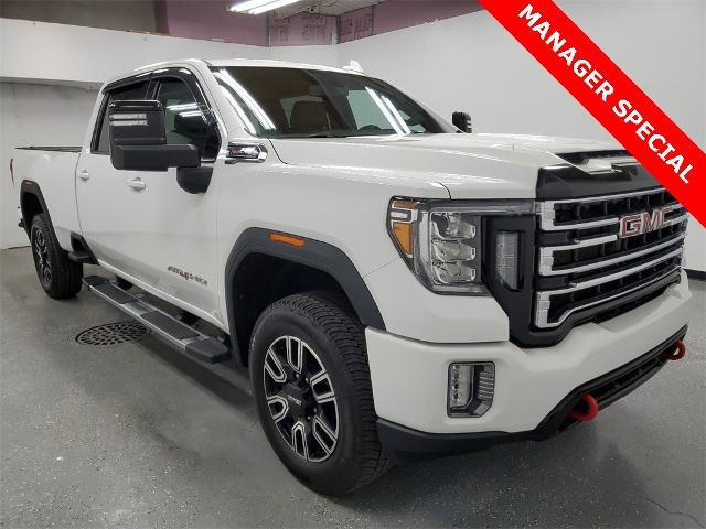 Used 2021 GMC Sierra 2500HD AT4 with VIN 1GT49PE72MF138650 for sale in Saginaw, MI