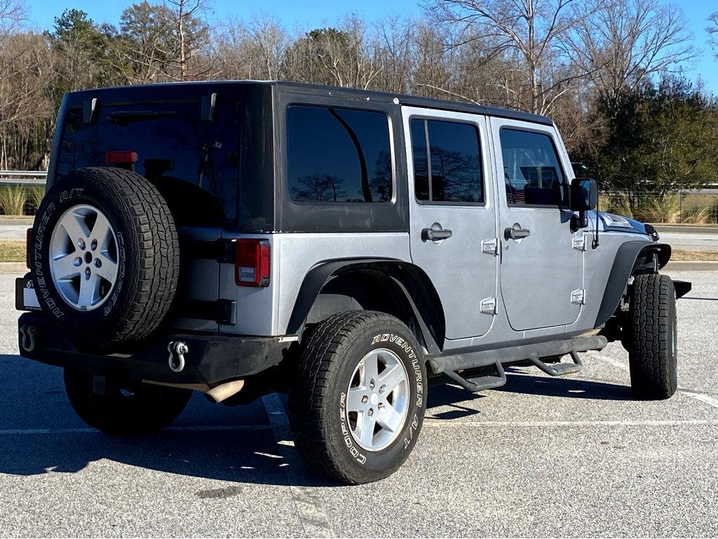 Used 2014 Jeep Wrangler Unlimited Sport with VIN 1C4BJWDGXEL193649 for sale in Pooler, GA