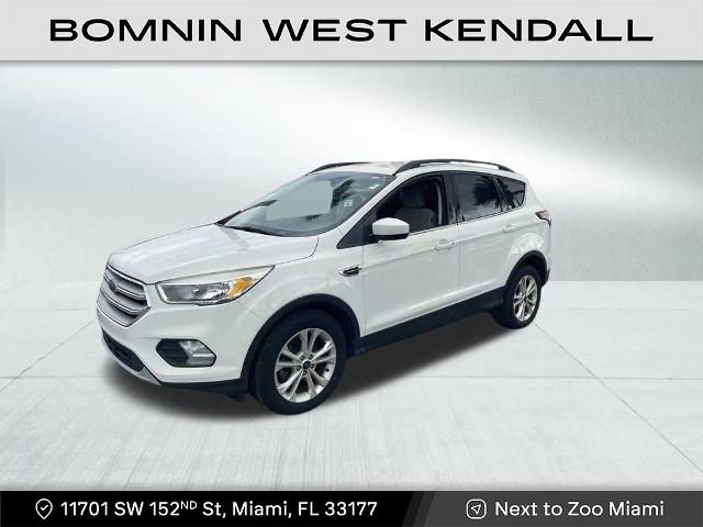 Used 2018 Ford Escape SE with VIN 1FMCU0GD8JUB61910 for sale in Miami, FL