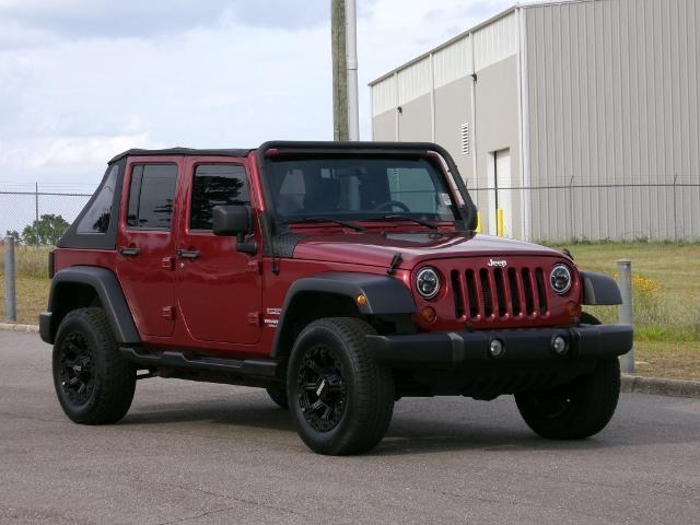 Used 2012 Jeep Wrangler Unlimited Sport with VIN 1C4HJWDG7CL109083 for sale in Ozark, AL