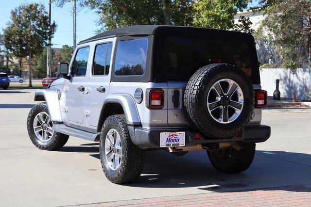 Used 2019 Jeep Wrangler Unlimited Sahara with VIN 1C4HJXEG0KW536185 for sale in Covington, LA